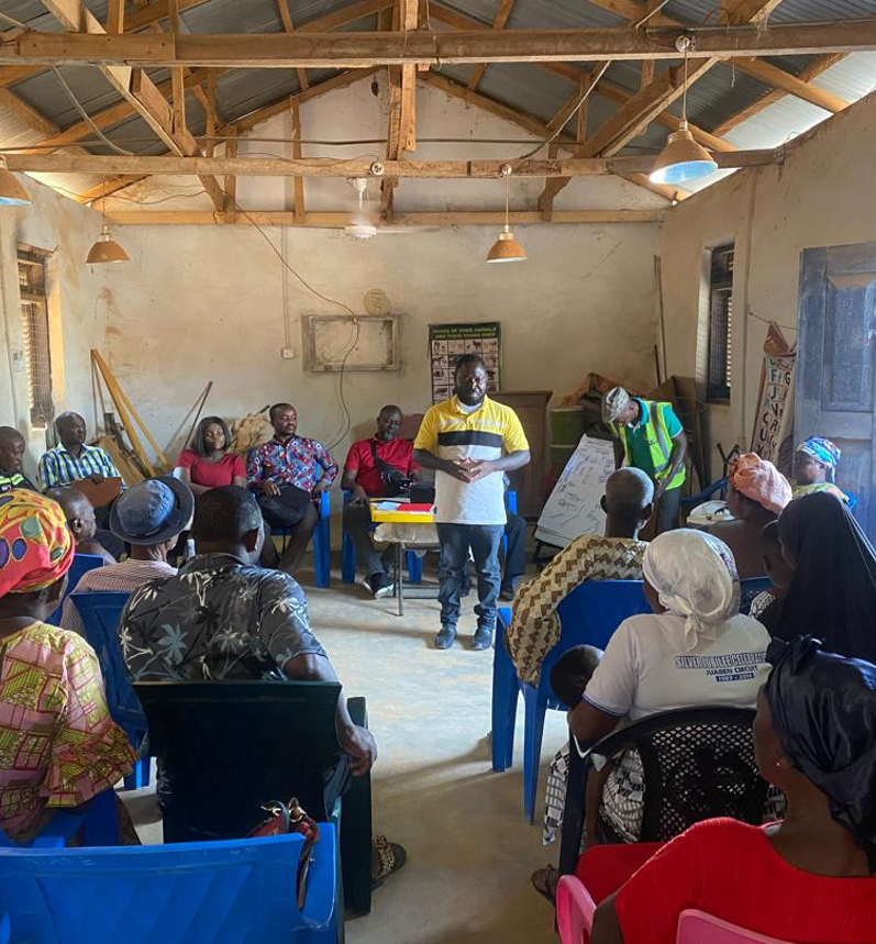 Sanbra trainer leading a practical session with a farmer group in Ghana